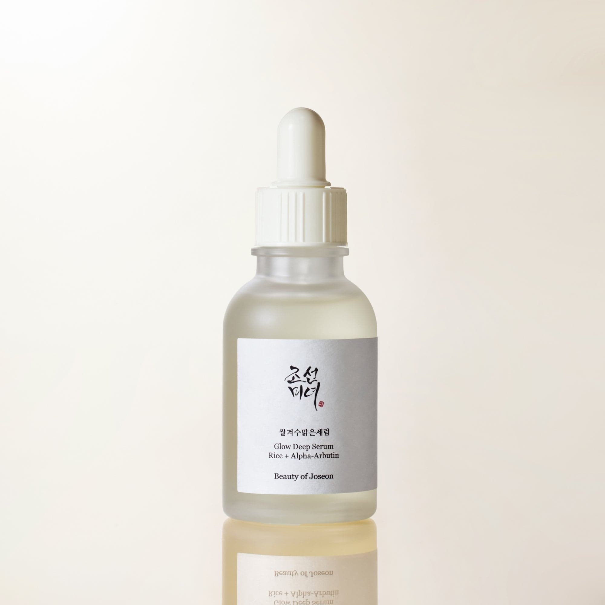 a bottle of liquid with a dropper